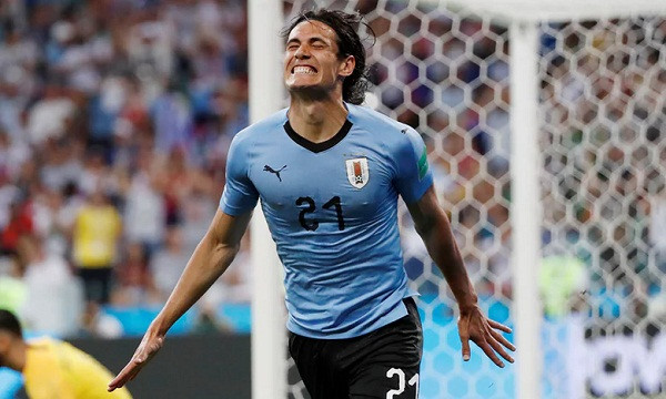 Cavani fires Uruguay into last eight as Ronaldo dream ends